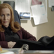 Gillian Anderson as Special Agent Dana Scully, wearing the face of a woman who is really, really done with all this.